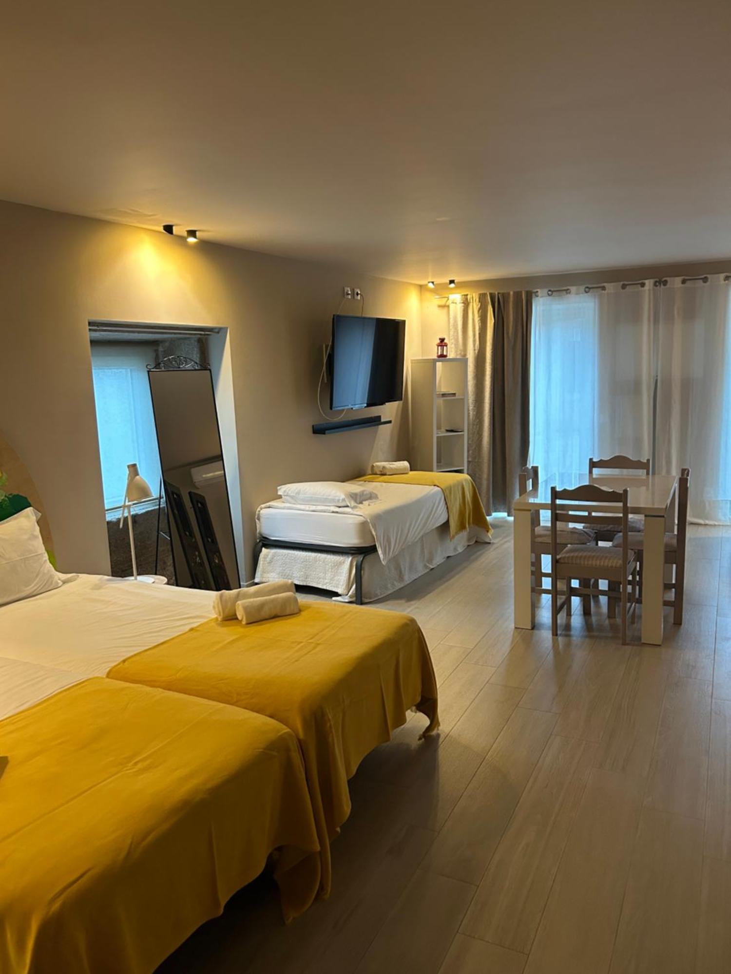 Апартаменты Casas Sebastiao - Tourist House Каминья Номер фото